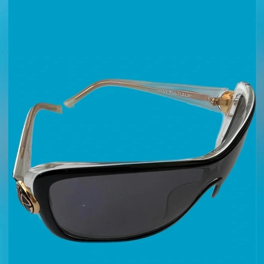 Lilly Pultzer wrap around sunglasses. Lenses has a few small scratches